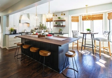 Decorative white and shaker black kitchen cabinets with butcher block countertop