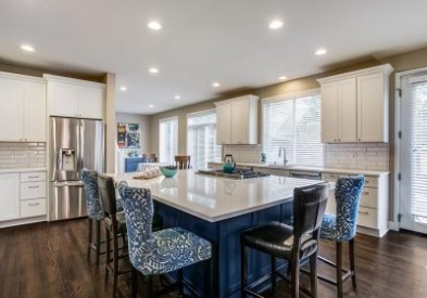 When a Washington homeowner found her kitchen flooded by a dishwasher, she didn't panic. Instead, she renovated her kitchen, adding a massive island.