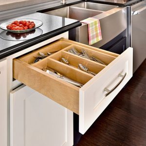 White shaker base cabinet with a cutlery divider in the drawer