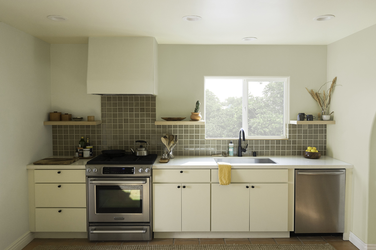 black cabinet knobs on contemporary slab door cabinets