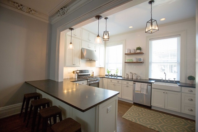 kitchen in brownstone row house viewed from dining room