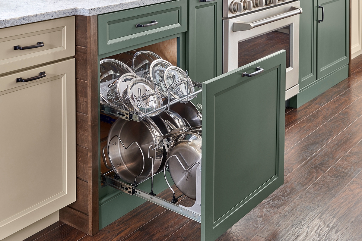 Craftsman pull out pots and pans storage cabinet in Eucalyptus classic paint