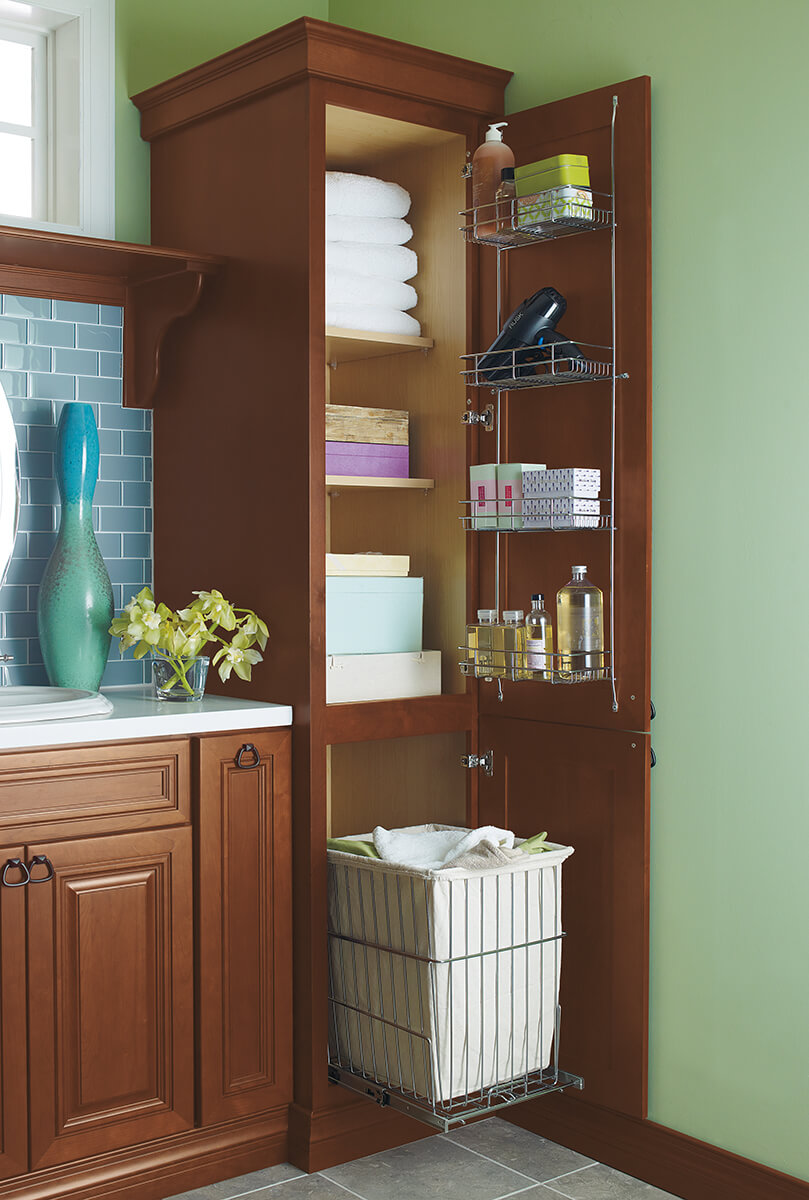 The image is of tall corner cabinets. A tall corner cabinet increases the amount of storage space with the additional cabinet height, which can be used to store and organize.