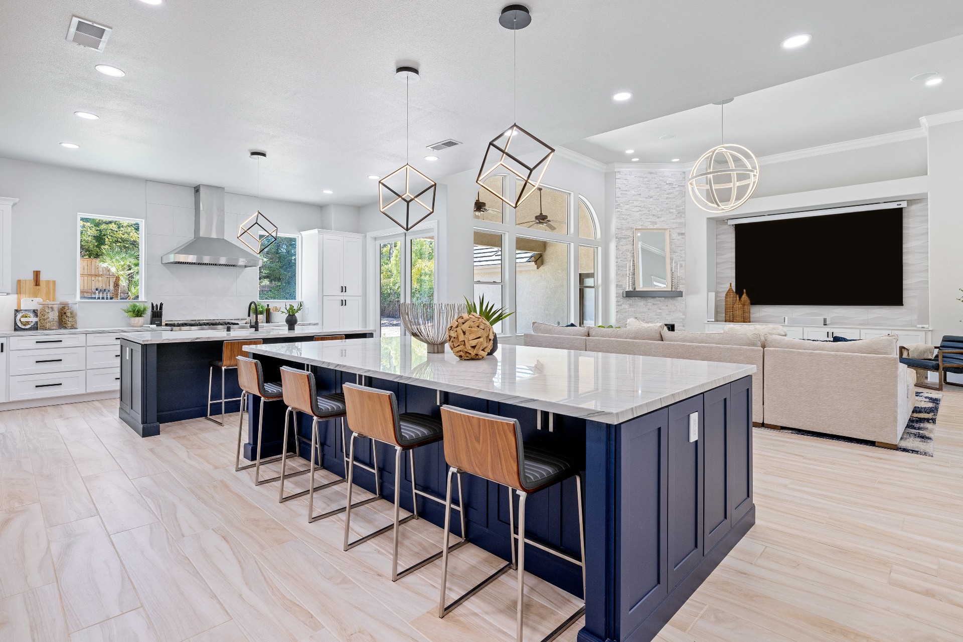 CliqStudios project: White shaker kitchen with two navy blue kitchen islands