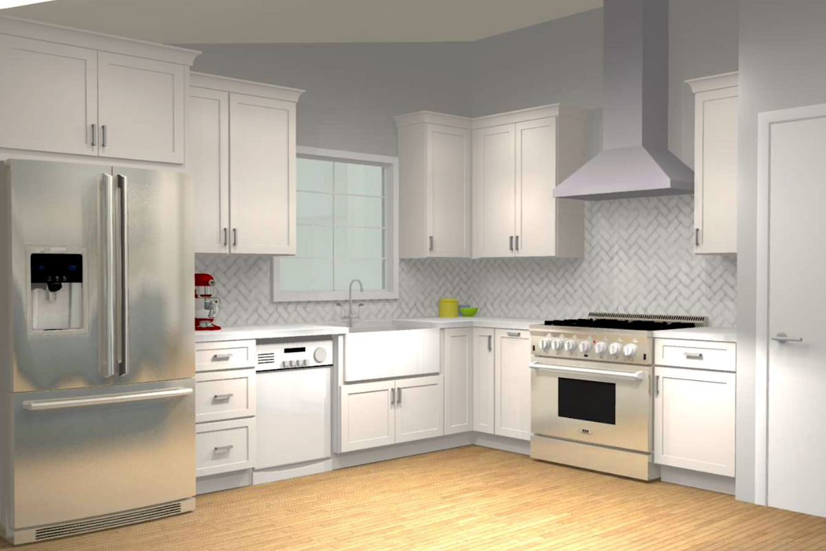 Cream-colored shaker kitchen cabinets with a matching wood hood and large stainless steel gas range