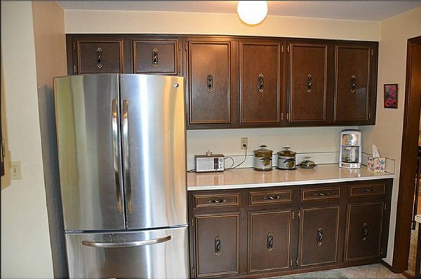 Before the CliqStudios remodel: Dated cabinets