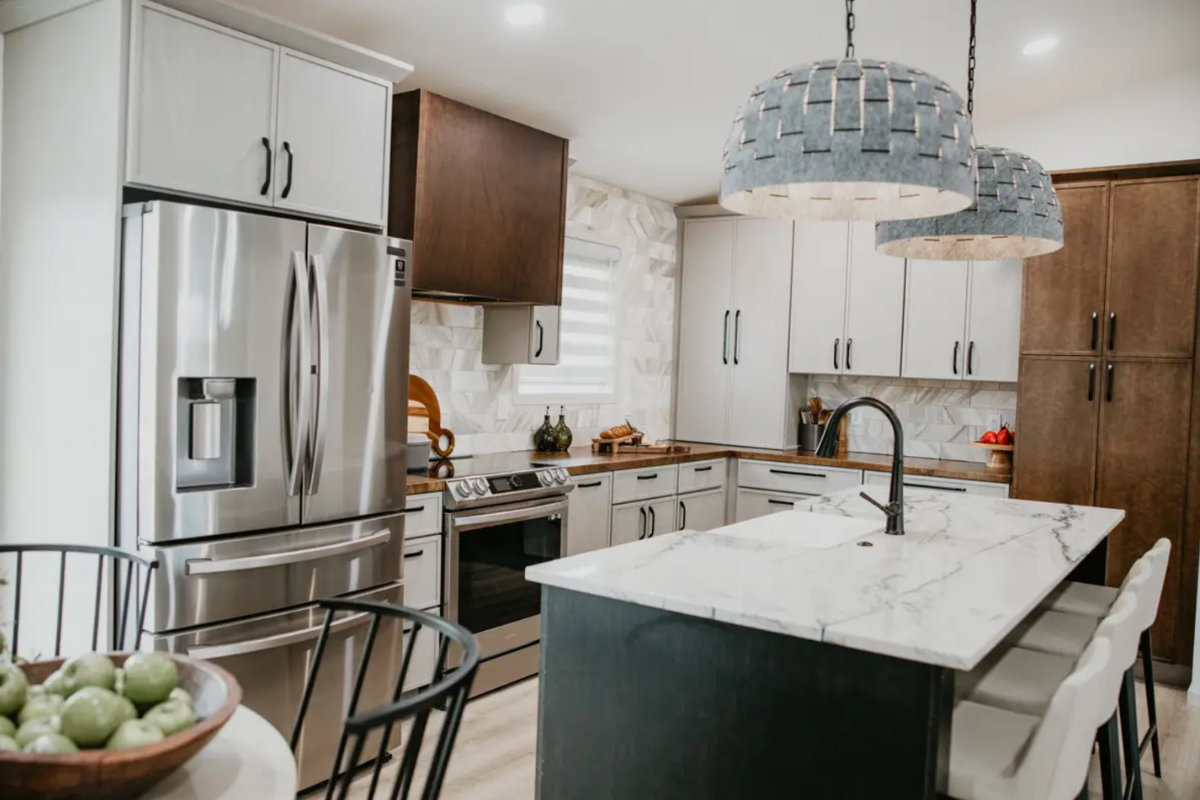 Tri-tone rustic kitchen design with skinny shaker cabinets and white stone countertops Tri-tone rustic kitchen design with skinny shaker cabinets and white stone countertops