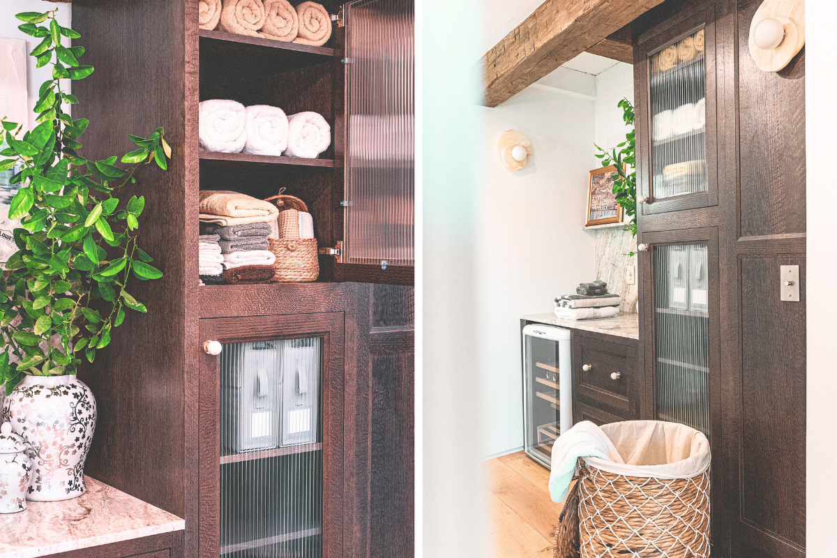 Dark brown oak inset hallway cabinets with reeded glass and a beverage cooler