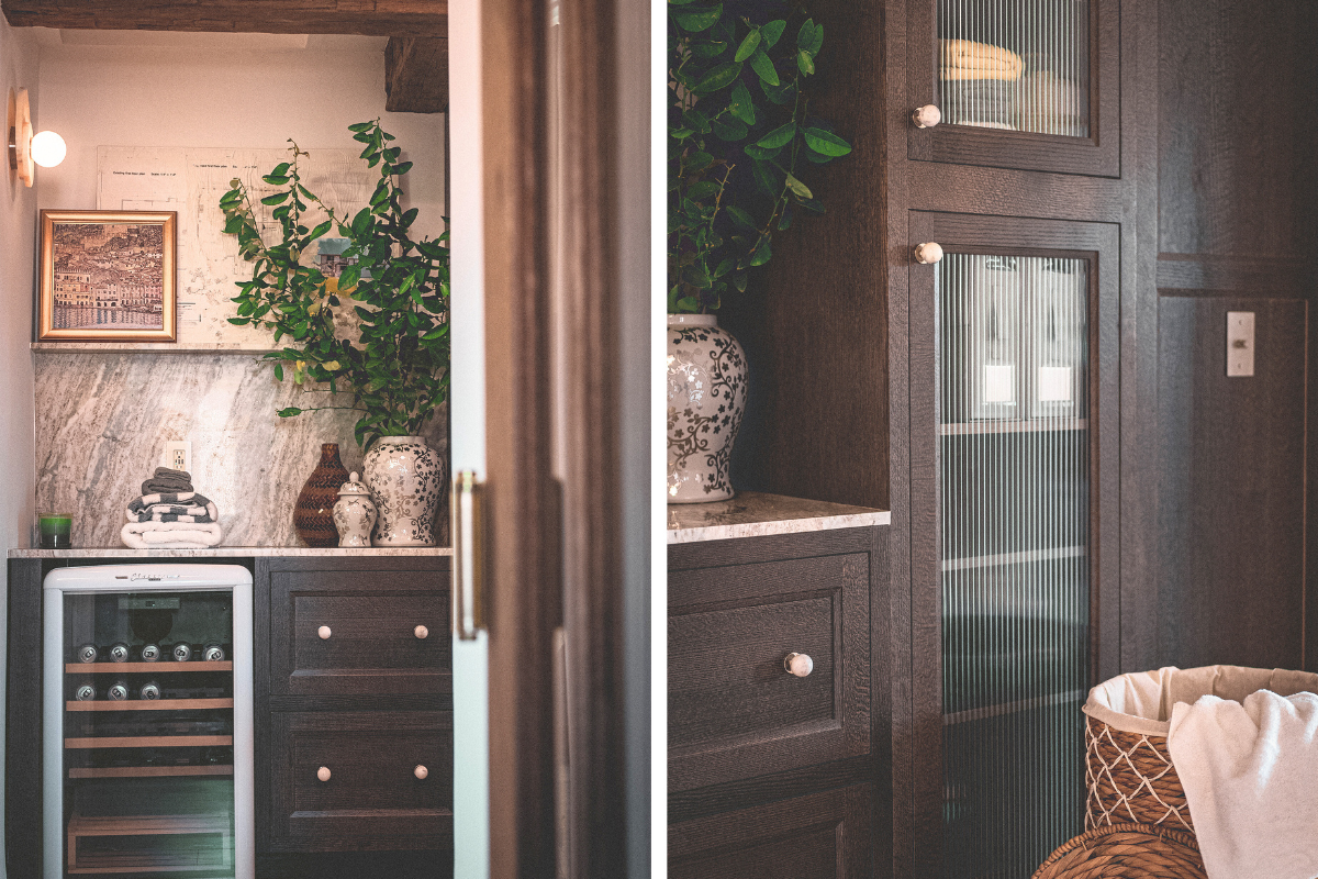 Dark brown oak inset hallway cabinets with reeded glass and a beverage cooler