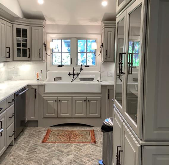 Gray Kitchen Cabinets with extra storage space. Amazing kitchen modifications with a vintage theme. Best example of using gray cabinets in kitchen and its benefits of bright cooking space.