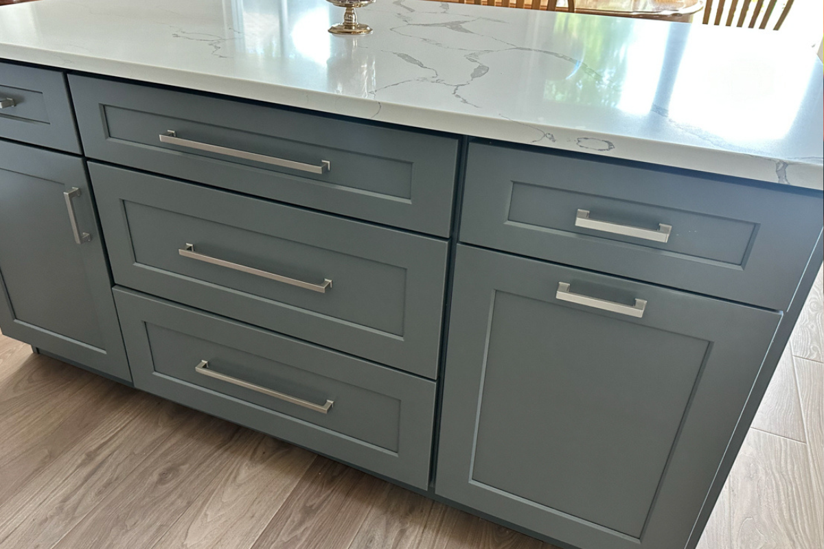 Gray shaker kitchen island cabinets with modern brushed nickel cabinet pulls