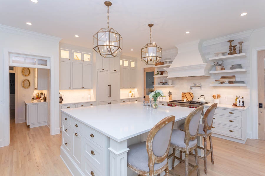 Kitchen with White Inset Door Shaker Cabinets, Large Island and Custom Build Range Hood