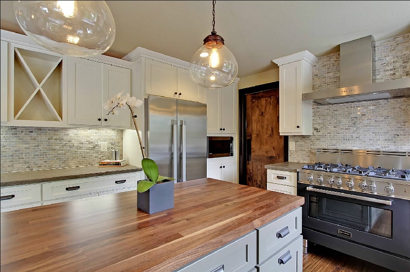 CliqStudios kitchen cabinets with wood countertop island