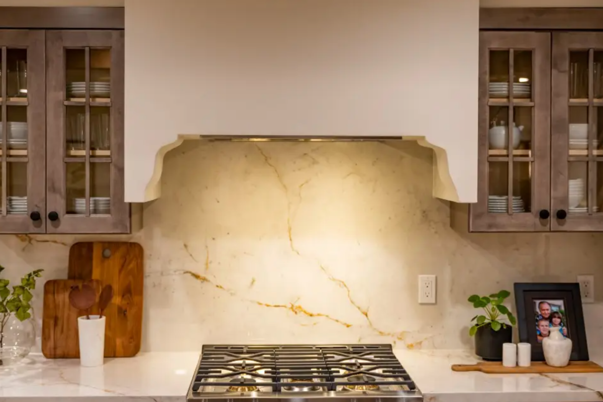 White plaster kitchen hood close-up