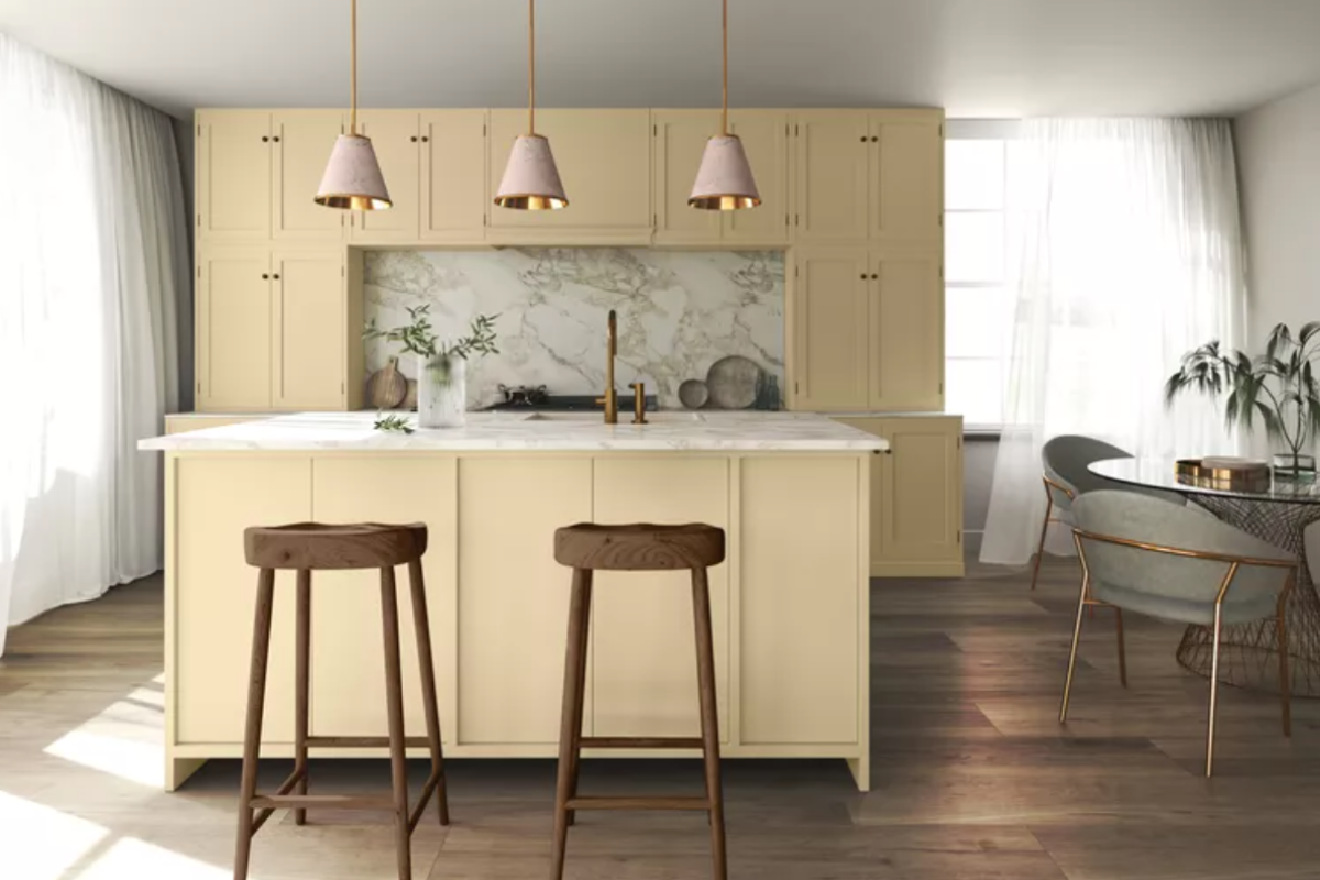 Light cream colored kitchen cabinets with bright yellow undertones