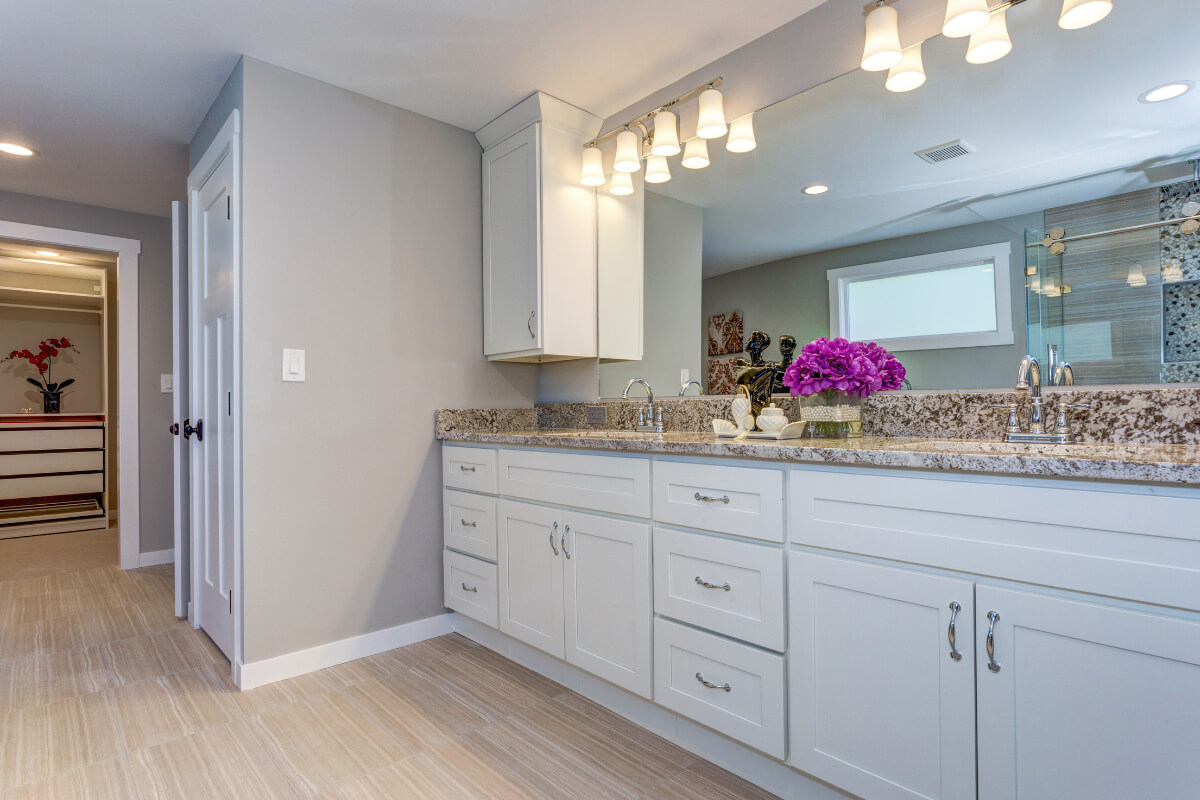 Long double vanity in white shaker door style