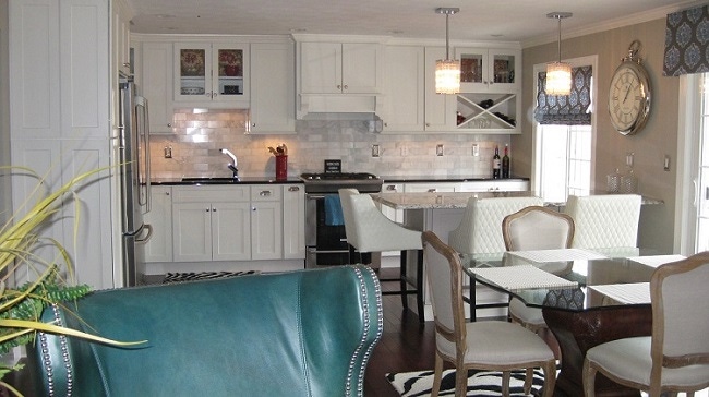 gray and white kitchen with shaker cupboards and marble backsplash