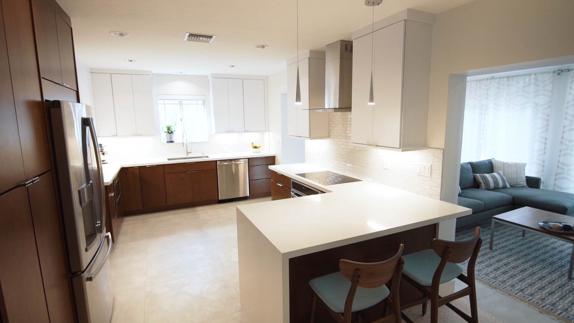 A mid-century design with two-tone cabinetry in cherry stain and white