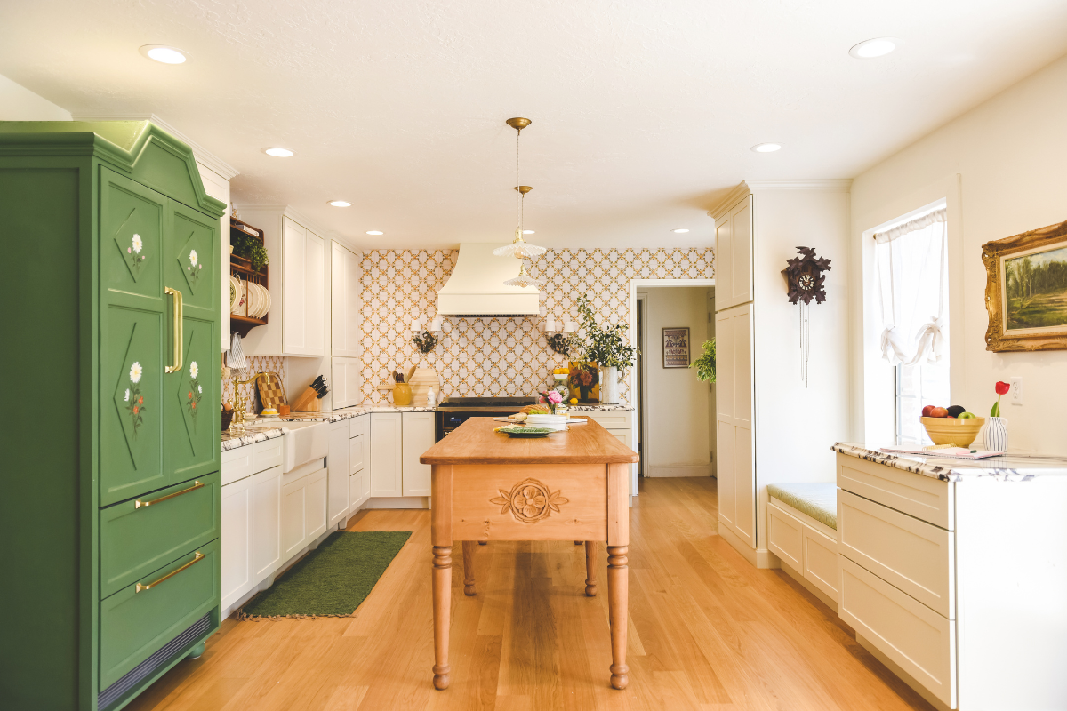 CliqStudios project: cream shaker kitchen cabinets with Scandinavian and green accents