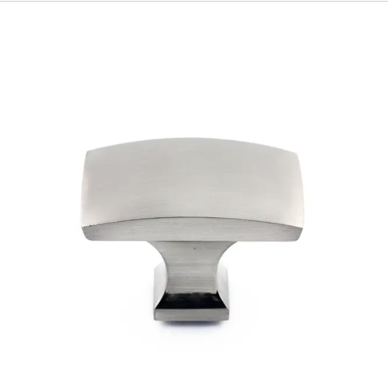 Curved metal knob in brushed nickel Transitional metal cabinet knob in brushed nickel with curved features