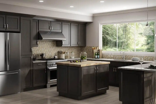 Large U-shaped shaker kitchen design with dark wood kitchen cabinets and island with brushed nickel cabinet pulls