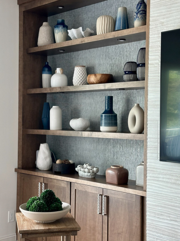 Dark brown stained shaker bookcase cabinets with floating shelves above