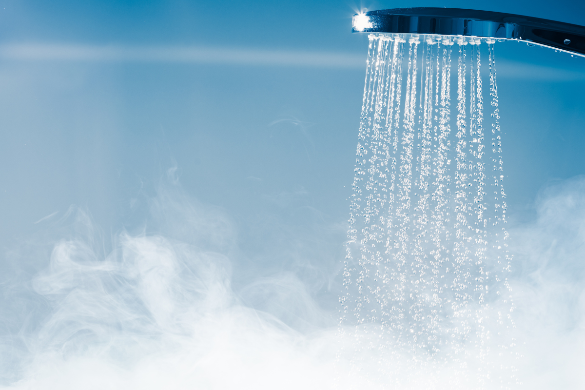 Chrome shower head in a steam shower