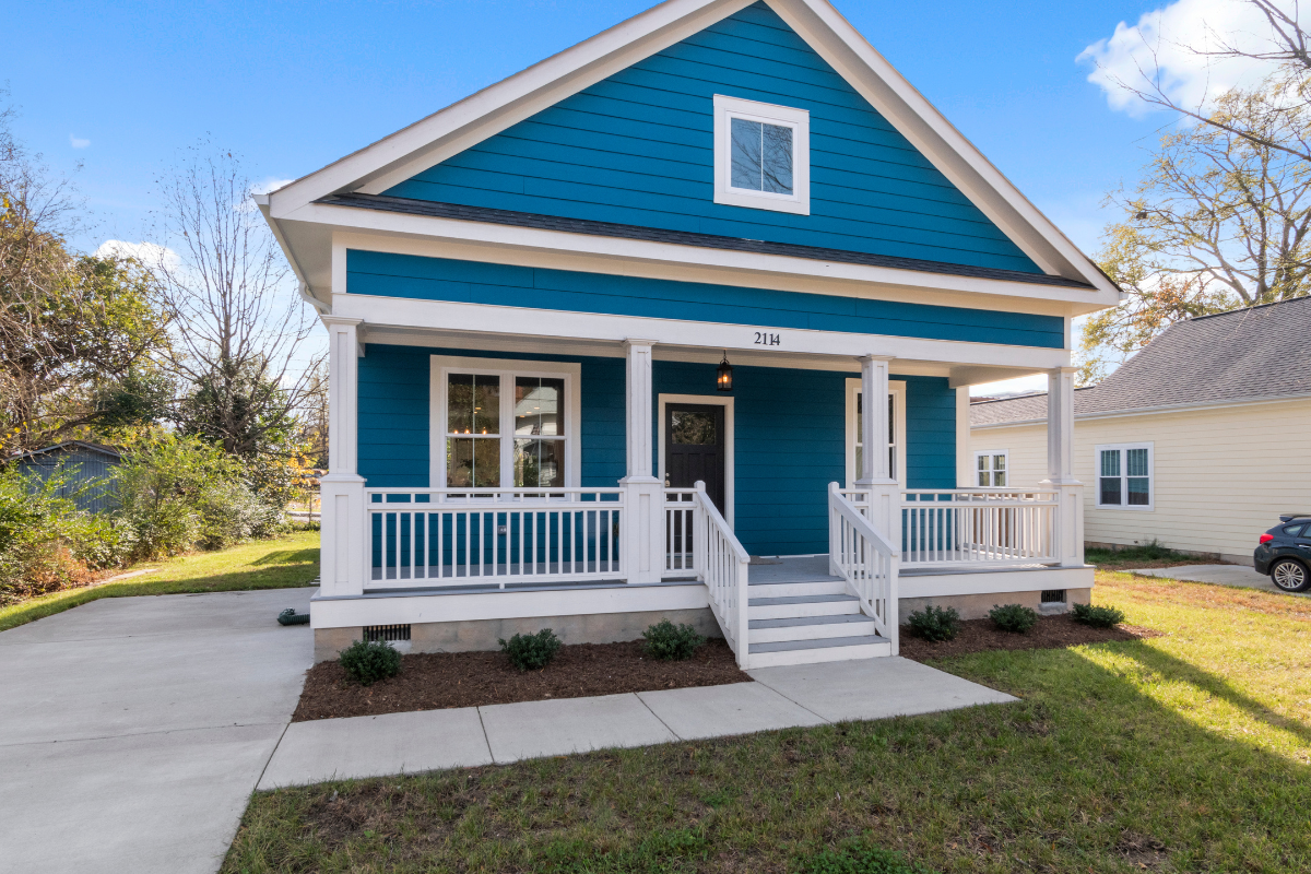 Traditional bungalow home painted teal