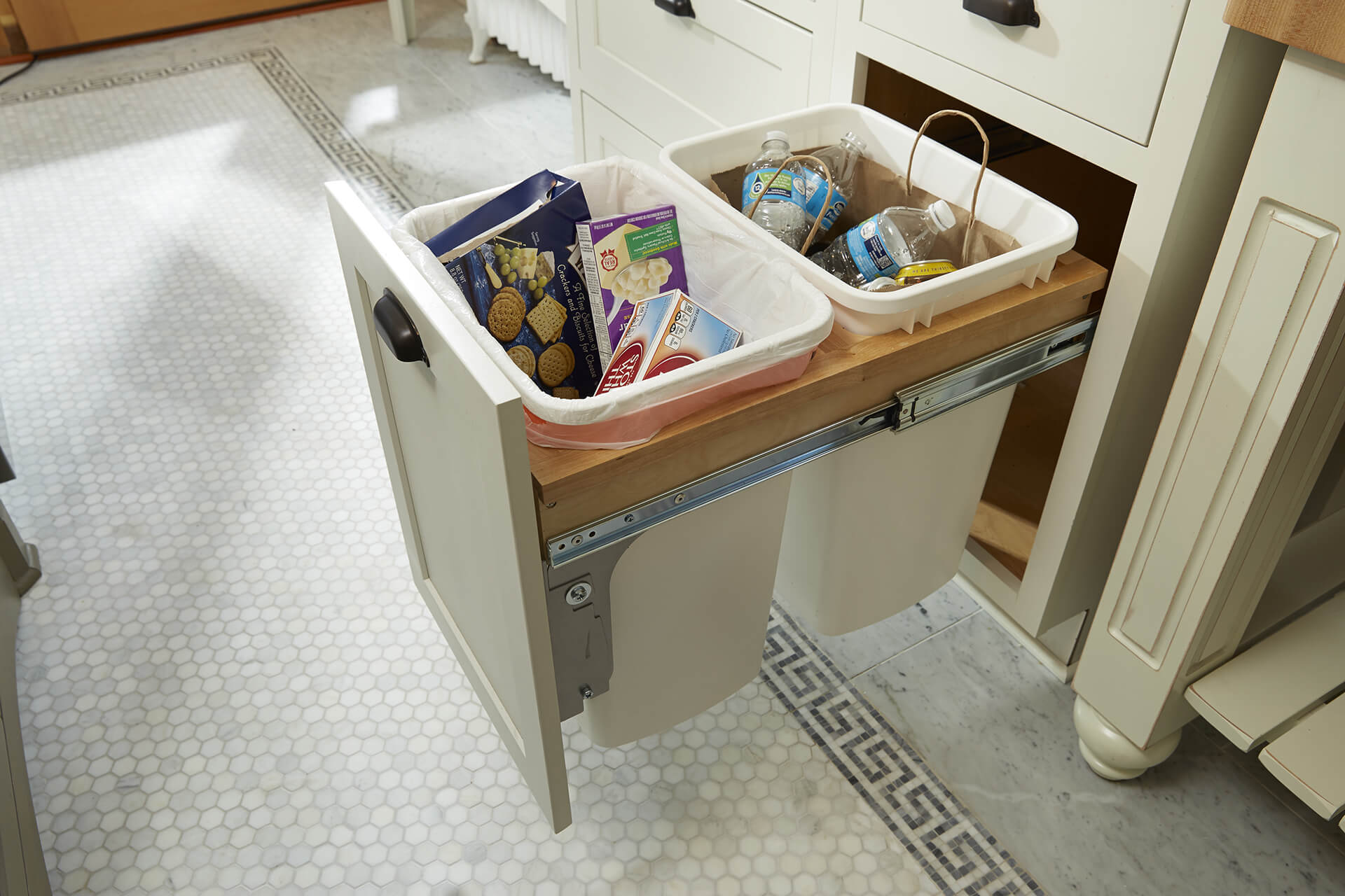 This image is of one of the most popular kitchen pull-out cabinet organizers – Waste Bin Storage.