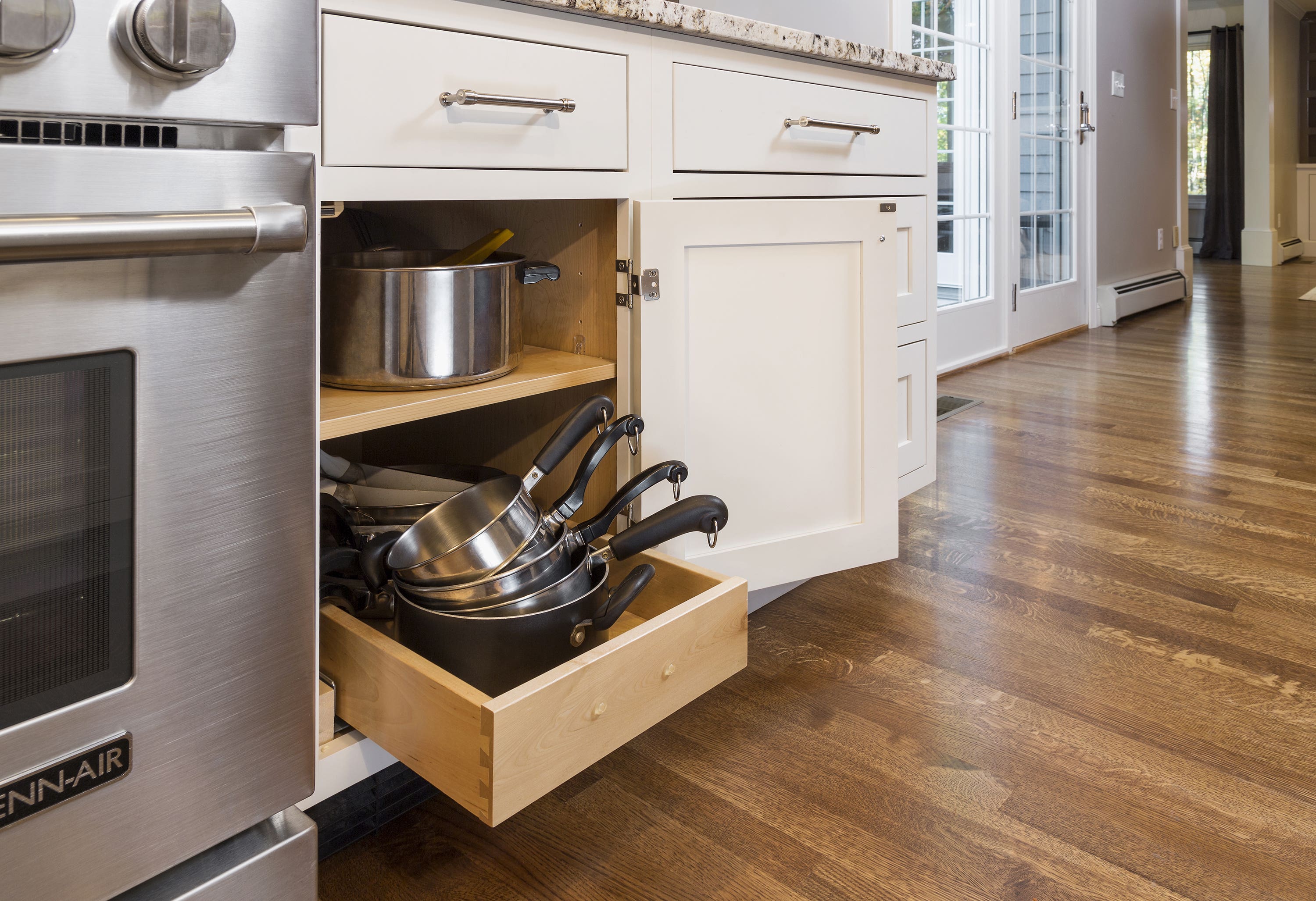 Adjustable shelves are great for organizing things from pots and pans to small kitchen appliances.