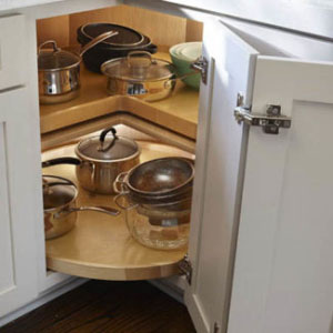 Corner lazy susan cabinet with two wood spinning trays