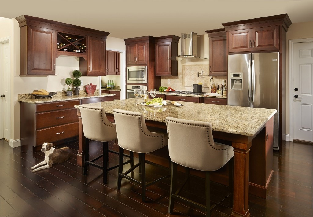 large kitchen with cherry cabinets and center island