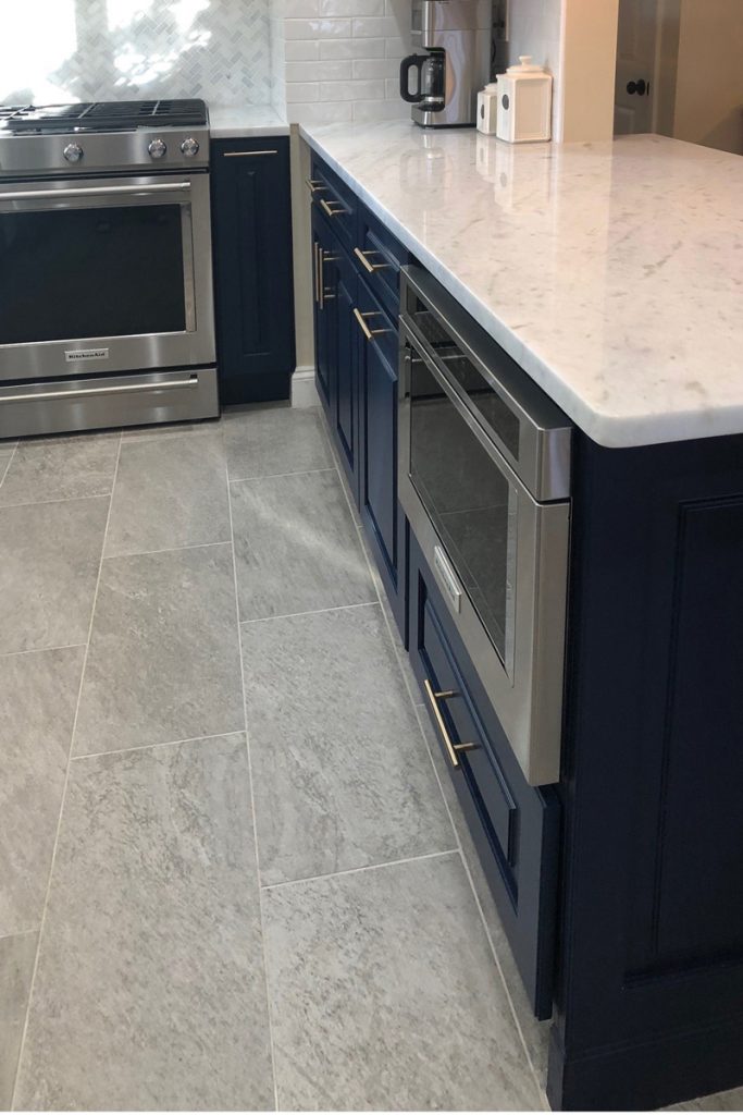 Microwave cabinet in a galley kitchen peninsula