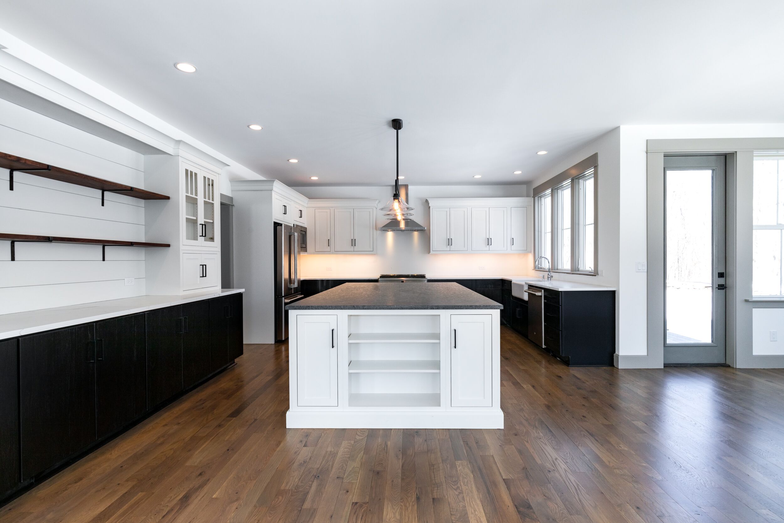 Modern farmhouse style black and white kitchen cabinets