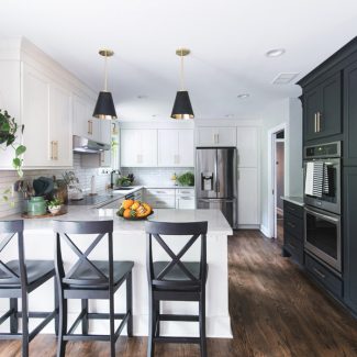 Black and white kitchen with shaker with large pantry wall