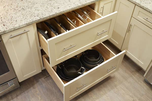 CliqStudios Shaker Cabinet in Painted Cream Multi-Storage Drawer cabinet organizing Lids for Pots & Pans