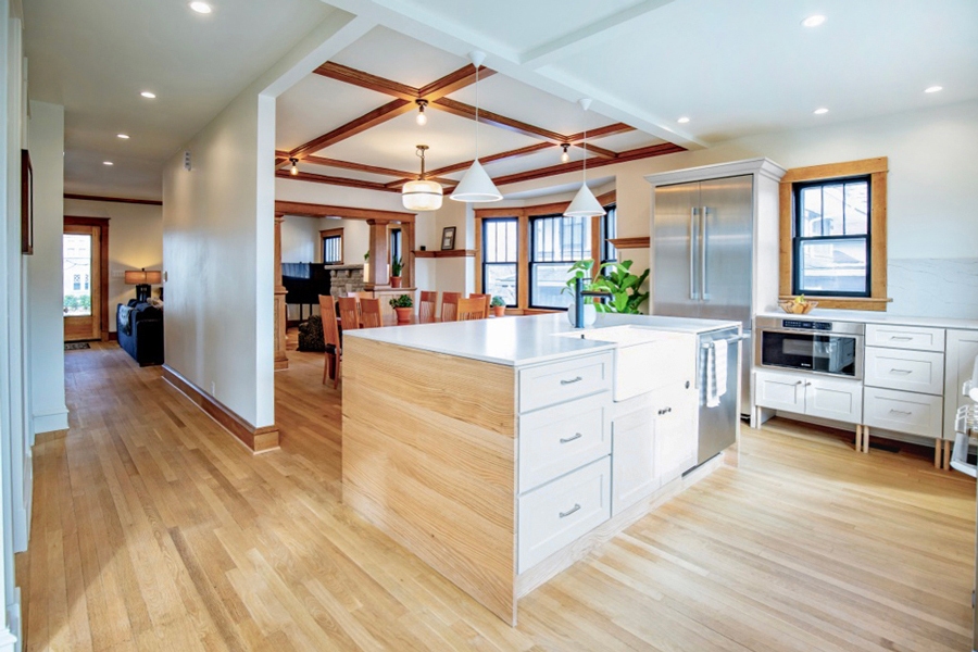 Open Kitchen with White Island Cabinets