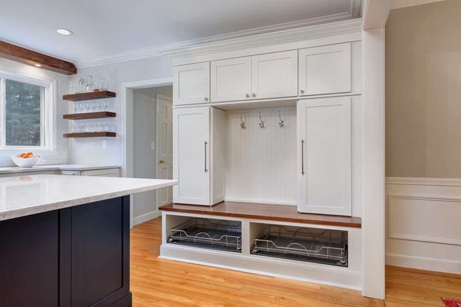 Custom entryway mudroom locker white cabinets shoe cubby beadboard back nickel coat hooks