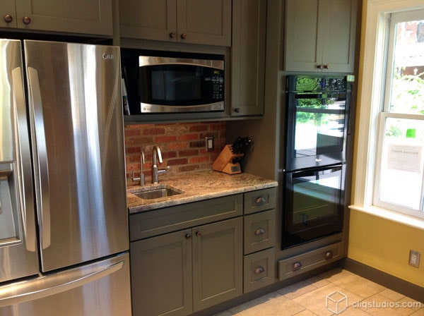 Shaker Kitchen Cabinets in Green prep sink