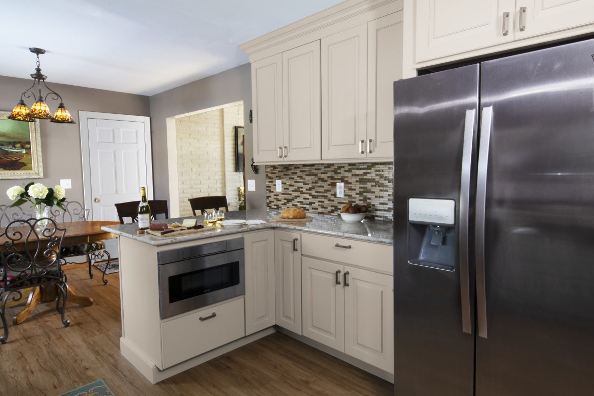 CliqStudios project: Light gray raised panel kitchen cabinets