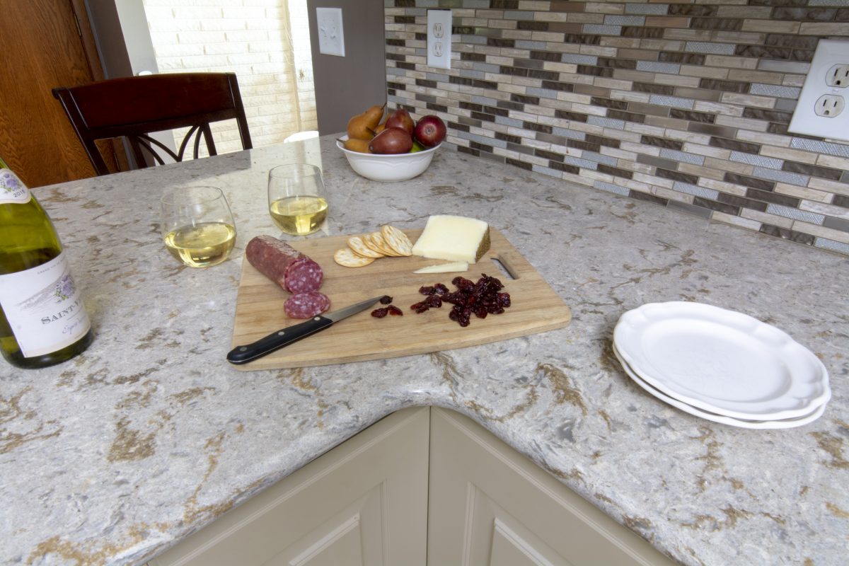 CliqStudios project: Light gray raised panel kitchen cabinets