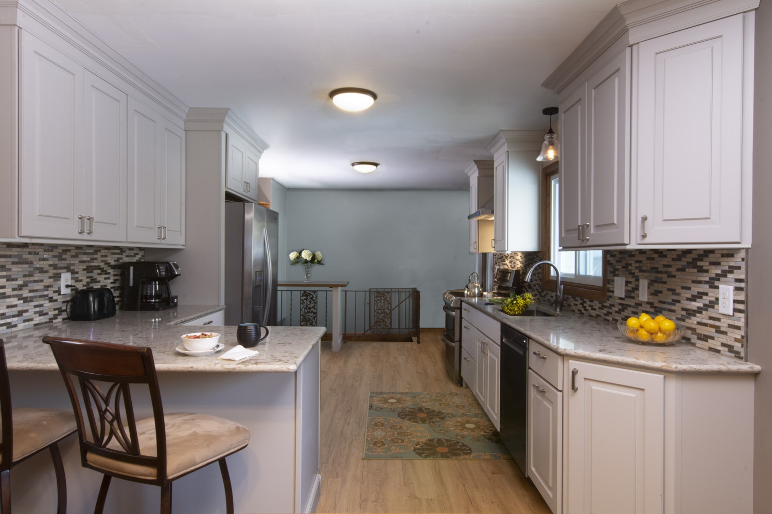 CliqStudios project: Light gray raised panel kitchen cabinets