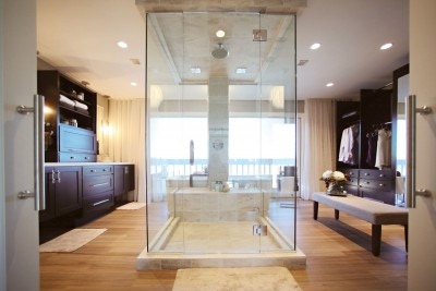 Photo gallery of remodeled bath features CliqStudios Shaker dark wood stain cabinets