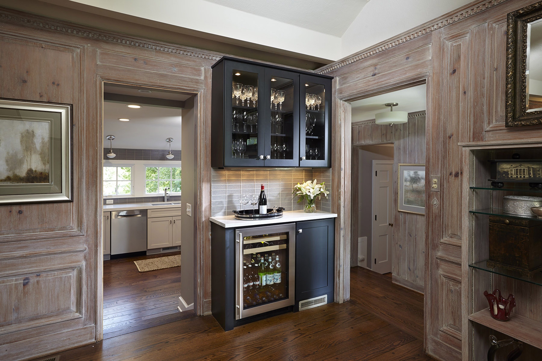 Modern wine storage bar in CliqStudios shaker cabinet style painted black.