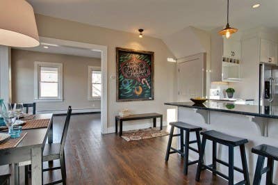 White Shaker Cabinets in an Open Transitional Kitchen Design