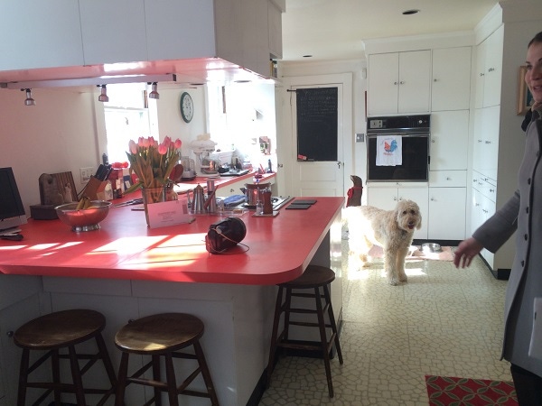 before kitchen with white cabinets and orange countertops