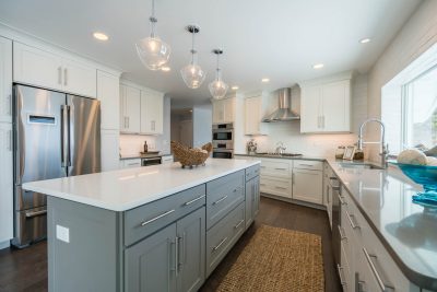 Shaker cabinets in white with Medium Gray kitchen island.