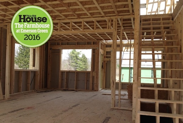 interior of home under construction with framing facing unfinished kitchen