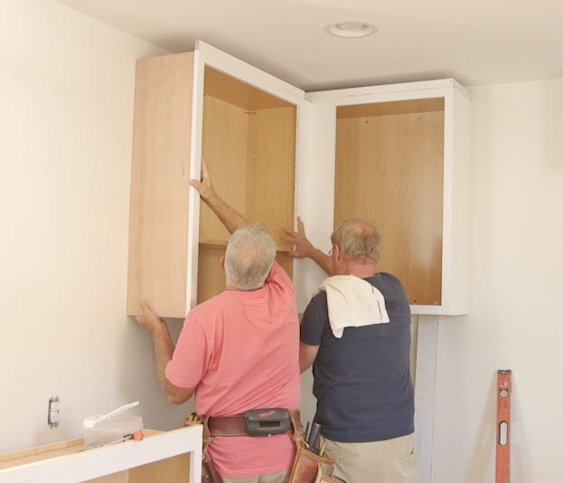 Installing wall shaker cabinets in pro remodeler project