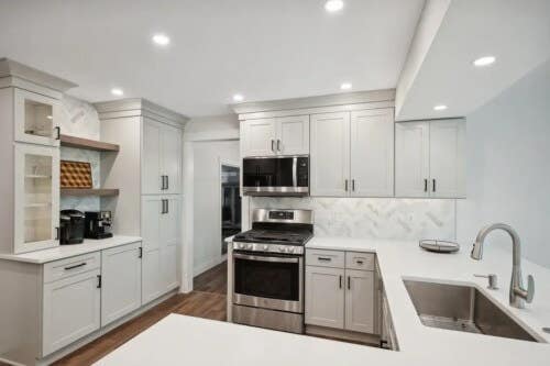 Light gray U-shaped shaker kitchen design